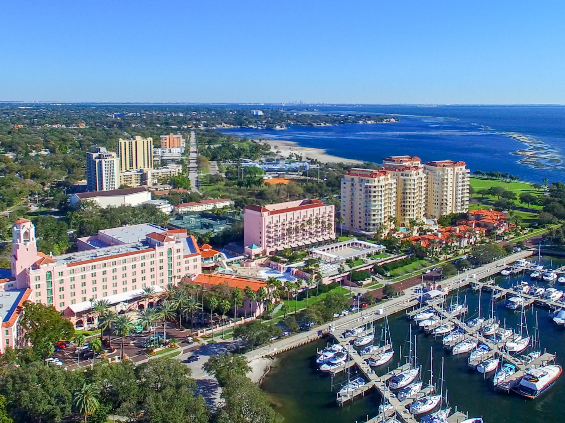 a view of the marina and buildings in a city